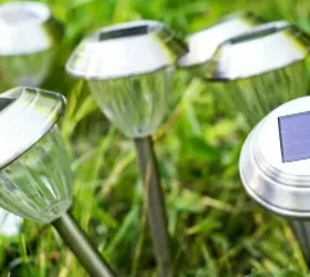 the best way to restore outdoor solar pathway lights, A bundle of silver solar pathway lights in green grass