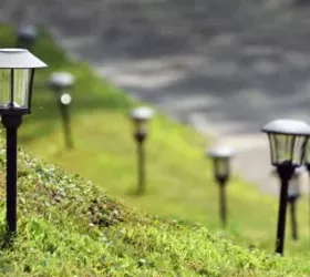 the best way to restore outdoor solar pathway lights, Solar lights that are stuck into the ground on a hill